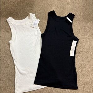 A New Day set of two tank tops. White and Black.